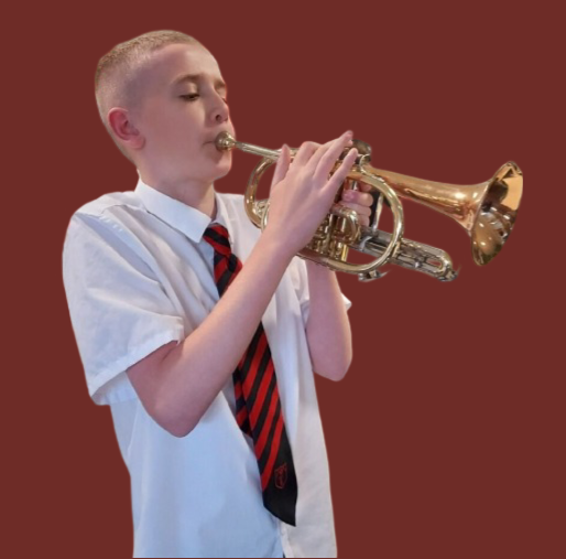 A student playing a cornet.